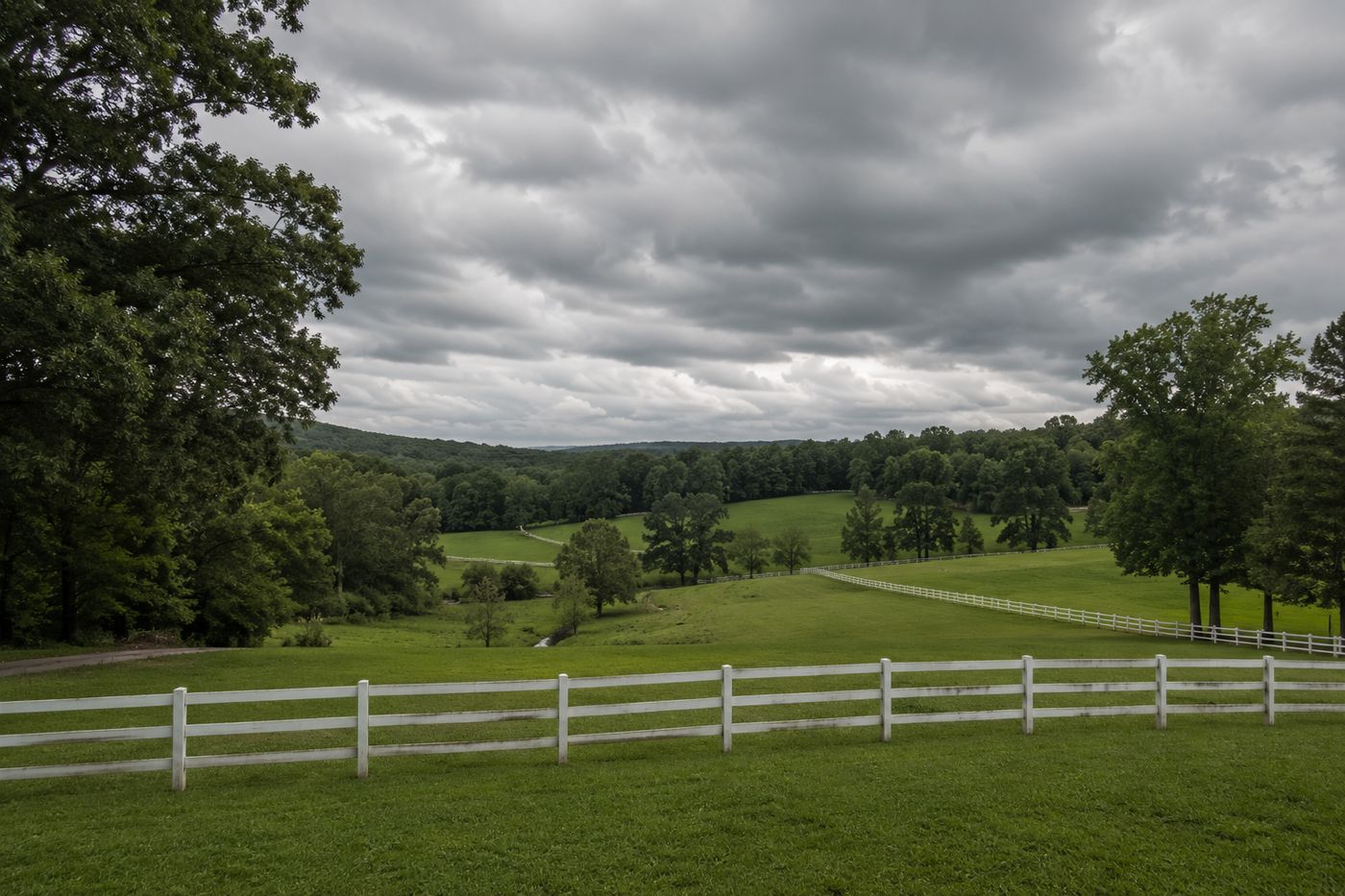 Rolling green pastureland and fenced acreage in the Georgia foothills near Jefferson and Athens